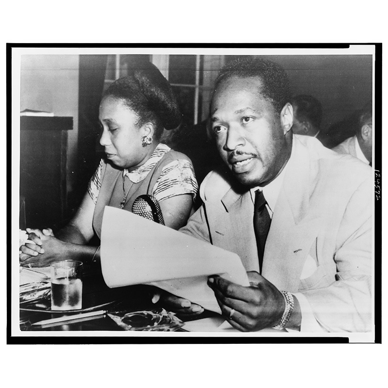 Josh White testifying before the House Un-American Activities Committee; his wife sits beside him. Library of Congress, Prints and Photographs Division, NYWT&S Collection, LC-USZ62-124572.