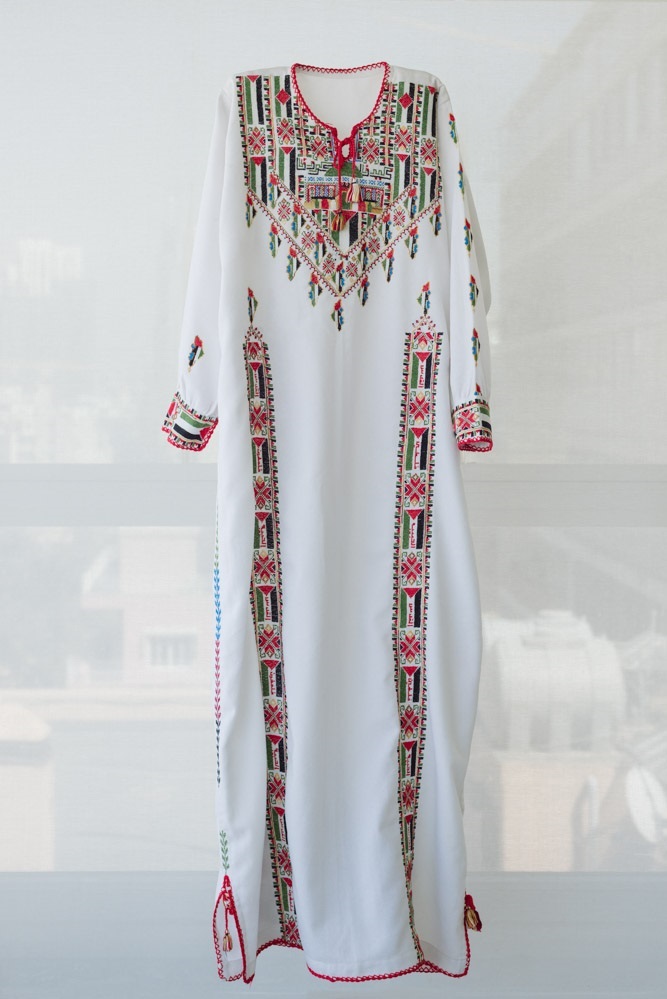 https://guernicamag.com/wp-content/uploads/2016/08/3-intifada-dress-1-7315-tiraz.jpg