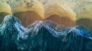 Tied on a beach seen from above illustrates the poem "Good"